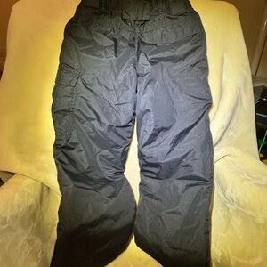 Snow pants. Insulated, adjustable waist, and snow gaiters. Boys size small. Ski